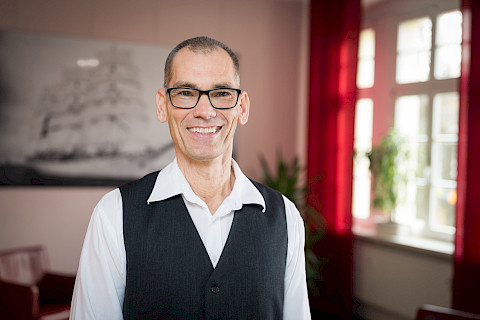 Herr Lars Kröger